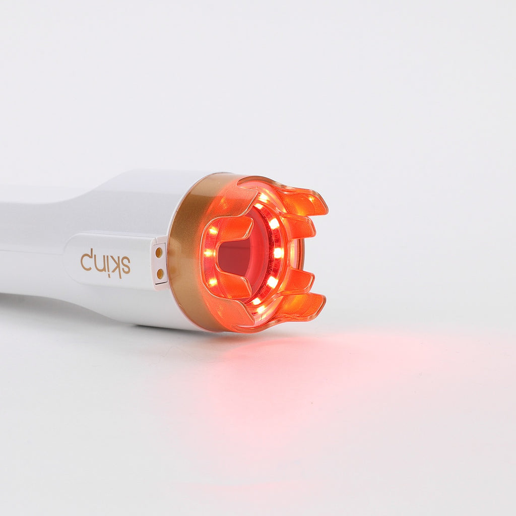 Skimp device with red light on a white background